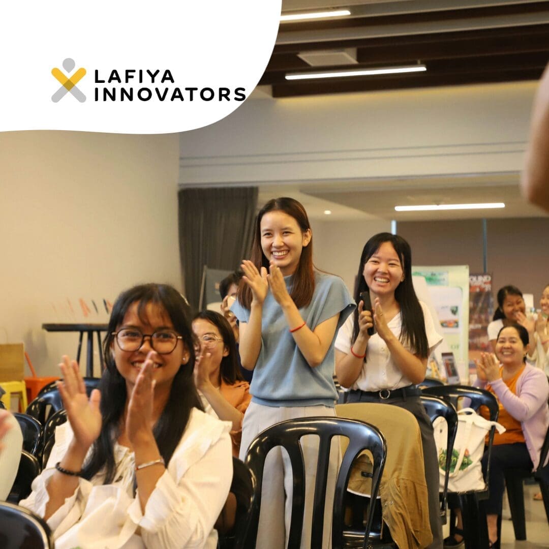 Female participants happy and giving applauses after their team got the winner award of Lafiya Innovator Program in Cambodia.