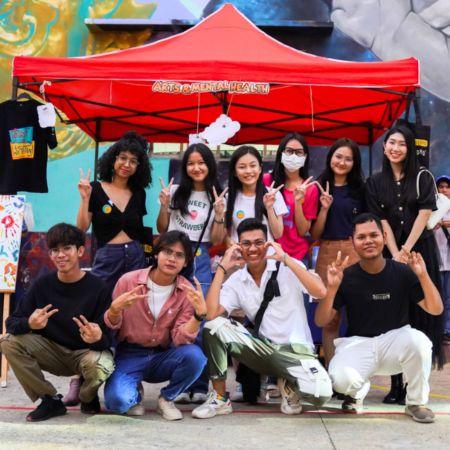 Group of delegates and Art of Mental Health team at Berk Chet Festival in Phnom Penh