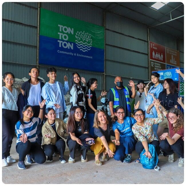 A group photo of participants in Impact Hub Phnom Penh's EPPIC program on plastic pollution, taken at TONTOTON's facilities in Sihanoukville