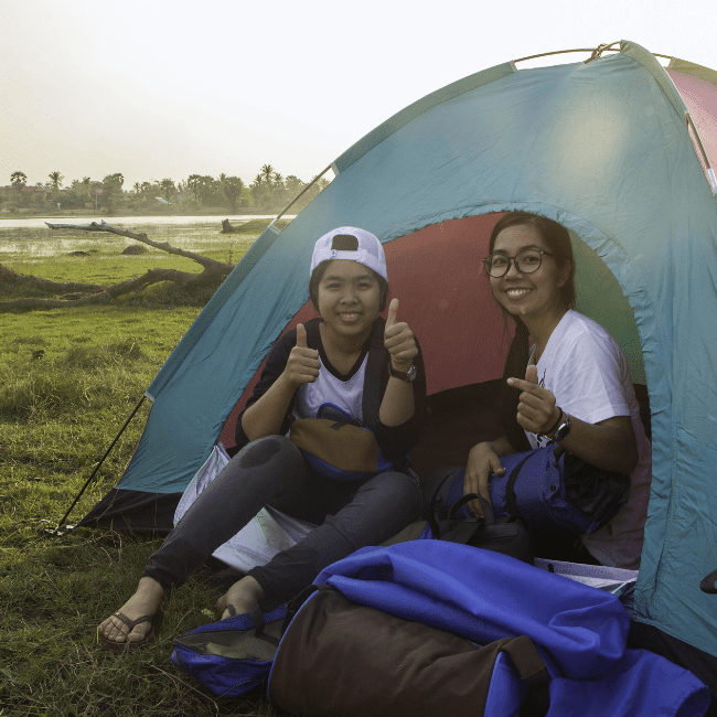 Two young enthusiast female on camping in Youth Eco Labs program in Cambodia