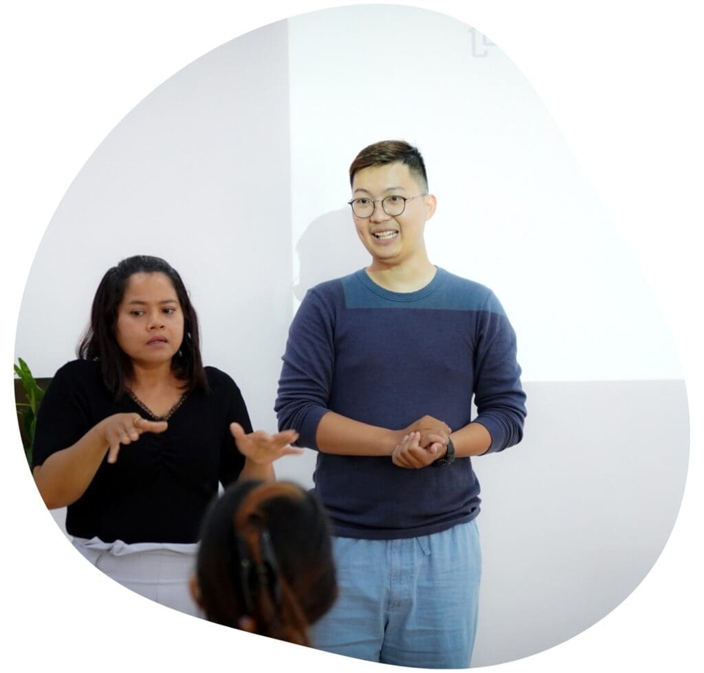 An Elevate male Speaker & female sign language interpreter